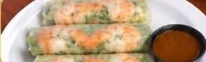 Fresh rice-paper spring rolls with shrimp and a bowl of dipping sauce